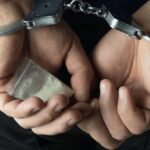 arrested-drug-dealer-handcuffs-package-600nw-1328265038