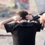 Hostage taking, rear view